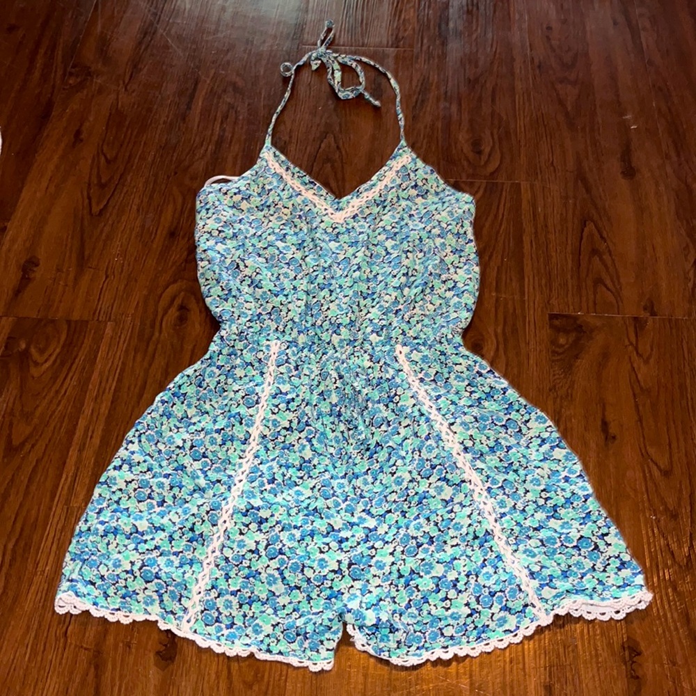Floral romper with adjustable straps